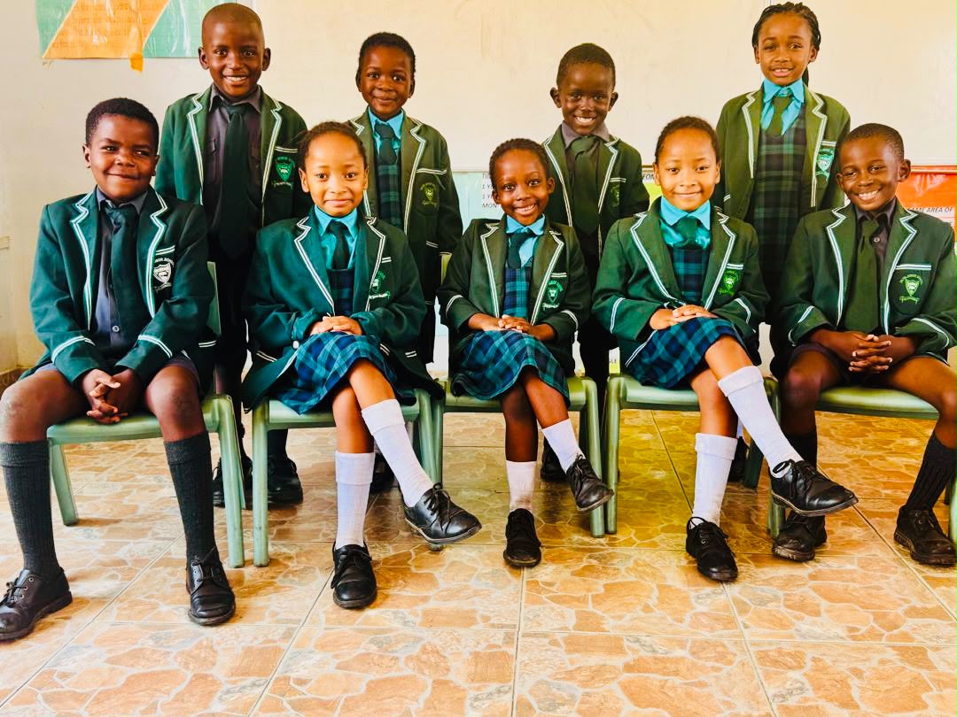 A class of pupils in school uniform