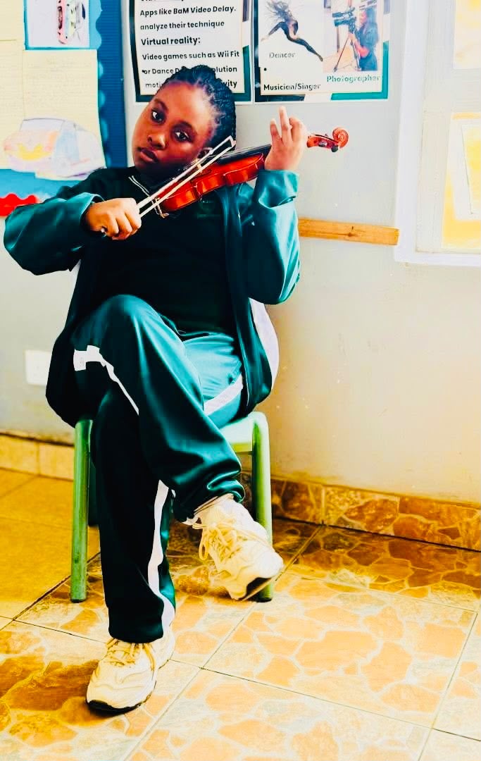 Pupil playing the violin