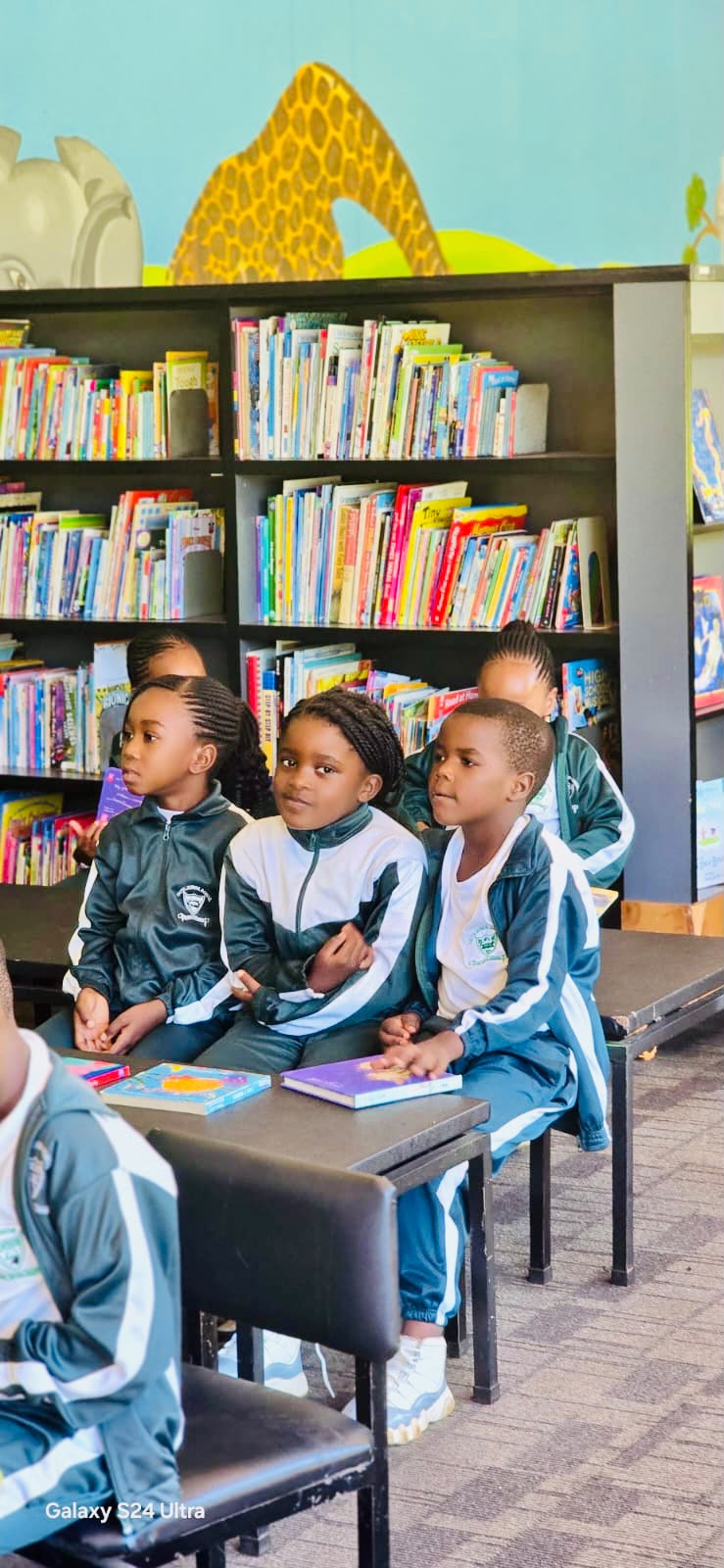 Pupils listening in the school library