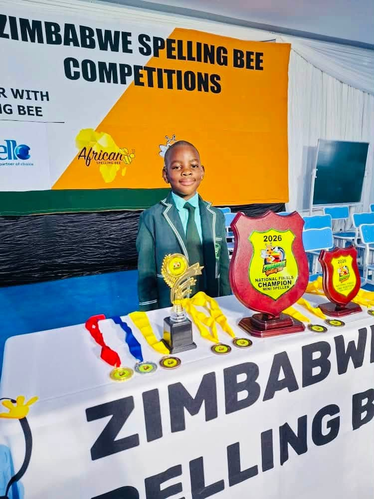 Hugh with his National Finals champion shields and medals