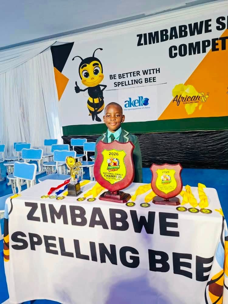 Hugh with his Spelling Bee trophies